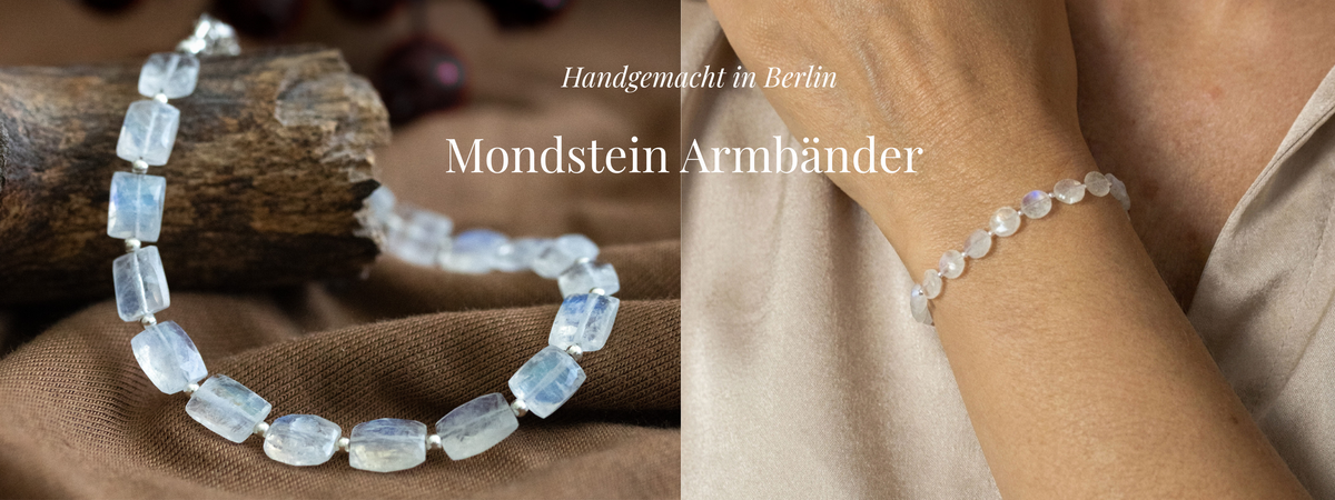 Zwei unterschiedliche Mondstein-Armbänder auf Dekoholz ausgelegt und am Arm getragen.